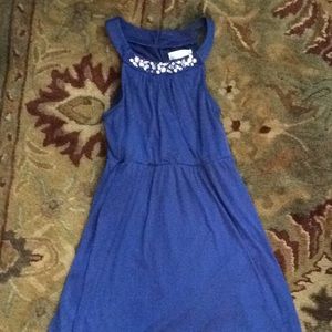 Royal blue dress that is about at knee-length.